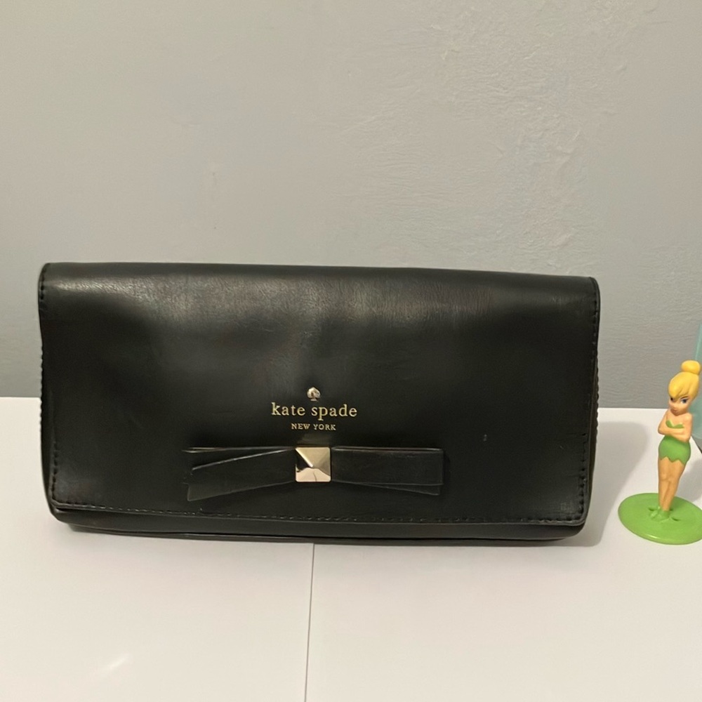 Kate Spade Black Leather Clutch 5.0 Inches Tall and 9.5 Inches Wide.
